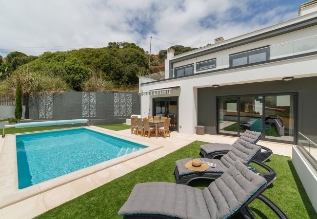 Casa de vacaciones en Venda Nova, piscina privada, cerca de la playa. Ideal para momentos inolvidables.