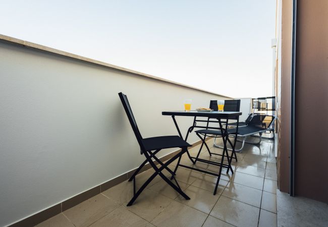 Logement de vacances balcon espace extérieur terrasse sch